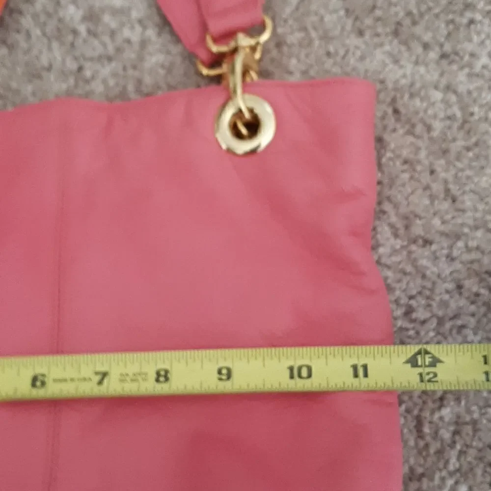 Pink and orange leathershoulder handbag